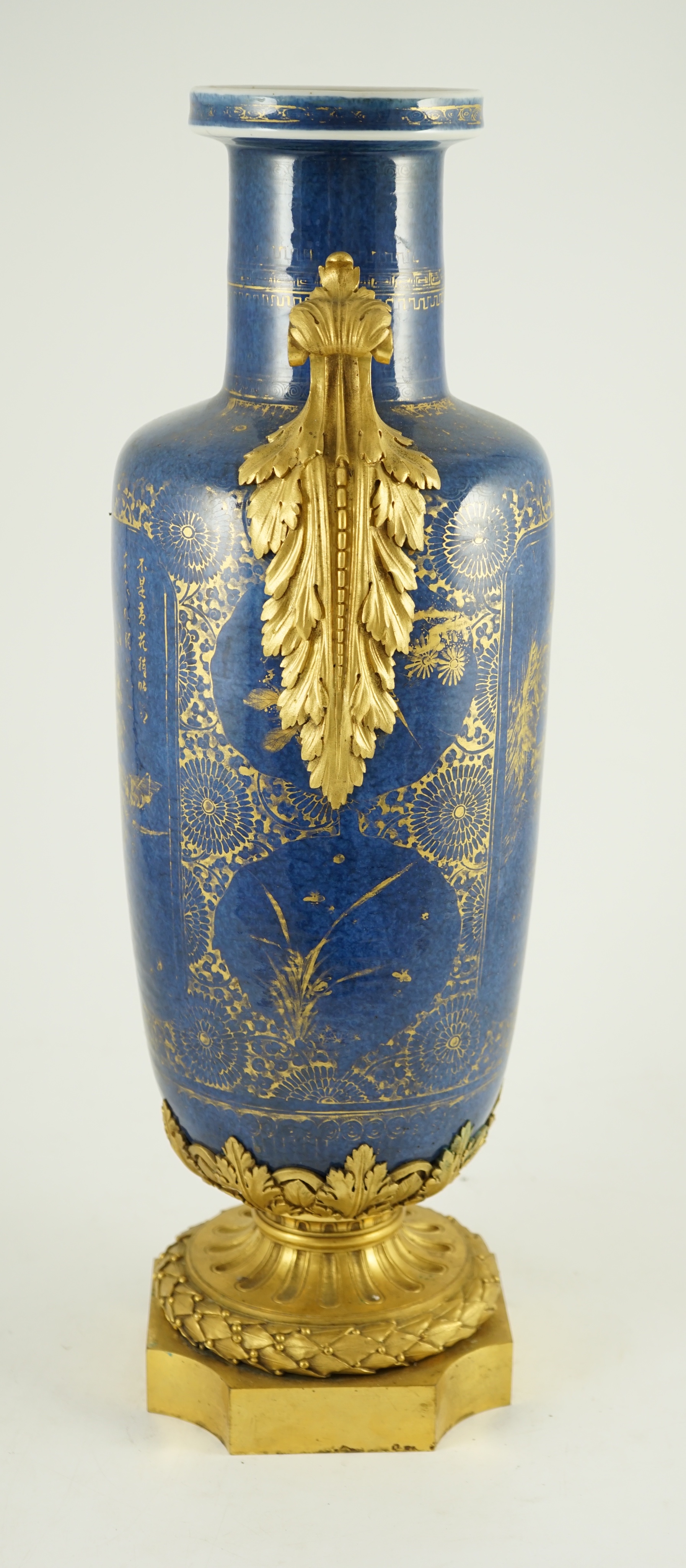 A Chinese gilt-decorated powder blue rouleau vase, Kangxi period, with French ormolu mounts, 55 cm high including ormolu mounts